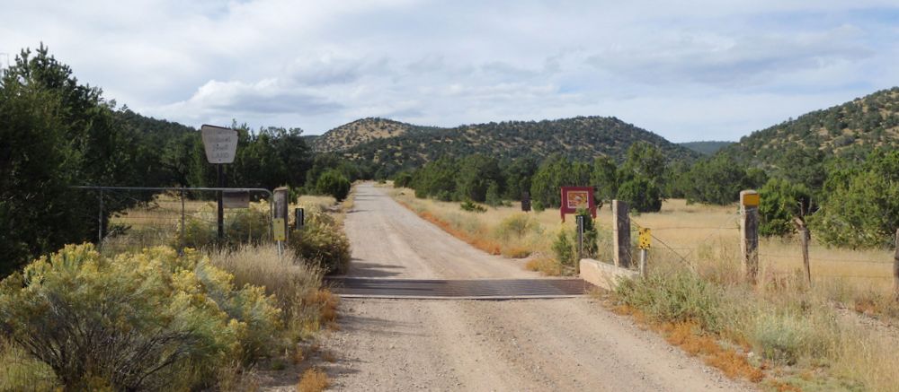 GDMBR: The gate and cattle guard at the entryway to Gila NF.